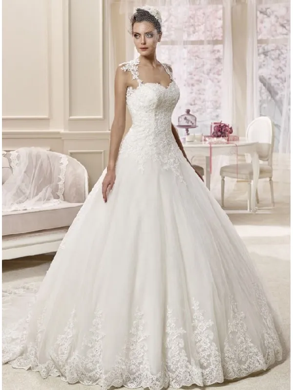 Abito da Sposa con bustino in pizzo e reggiseno interno e gonna ampia di pizzo