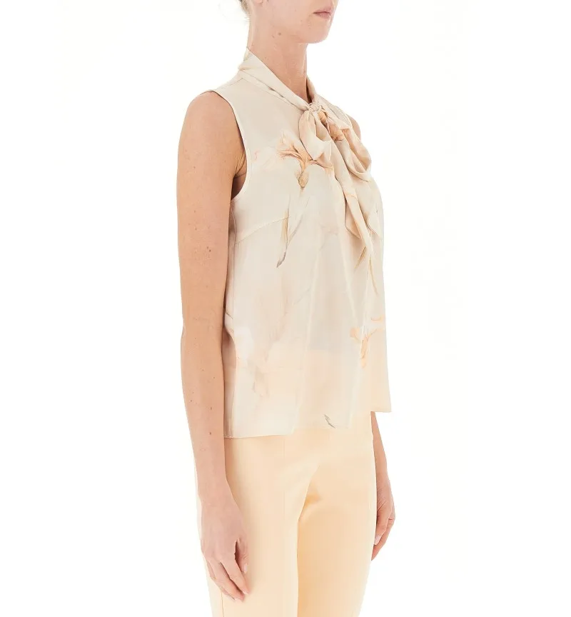 Blusa con fiocco