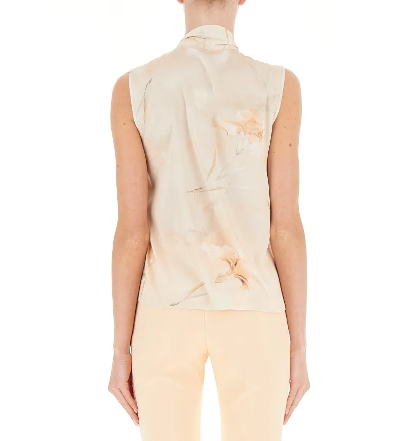 Blusa con fiocco