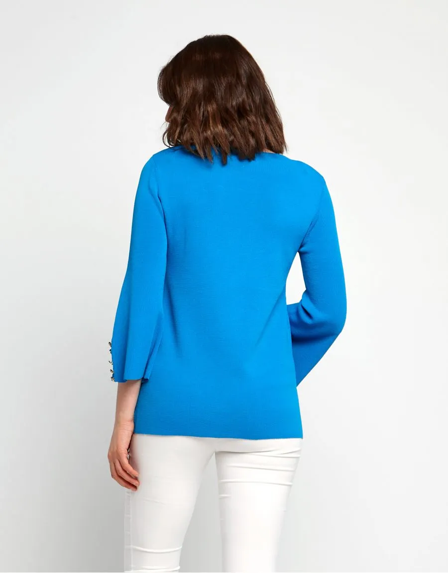 Maglia con bottoni ai polsi