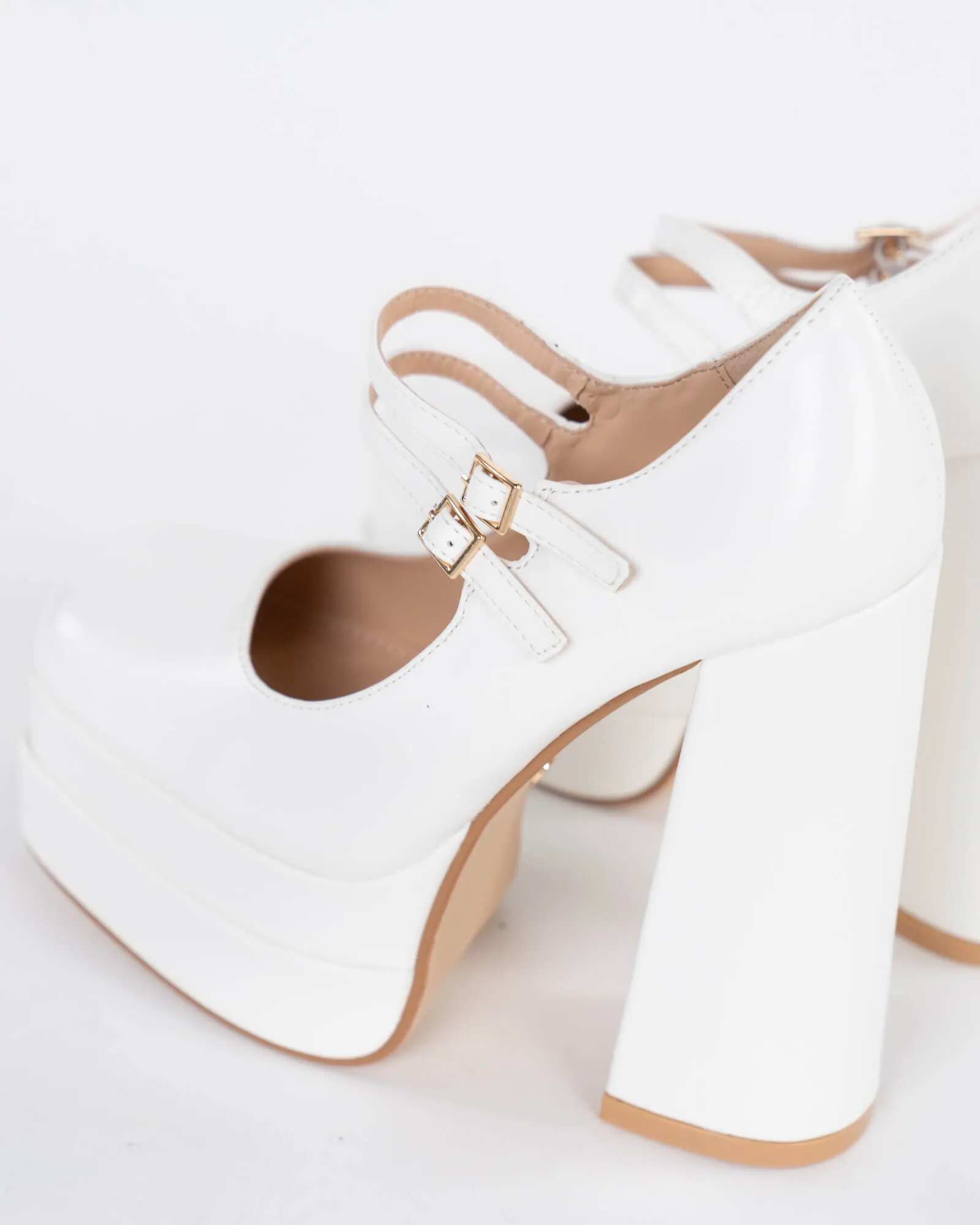 Mary jane in ecopelle con plateau alto e cinturini – Bianco