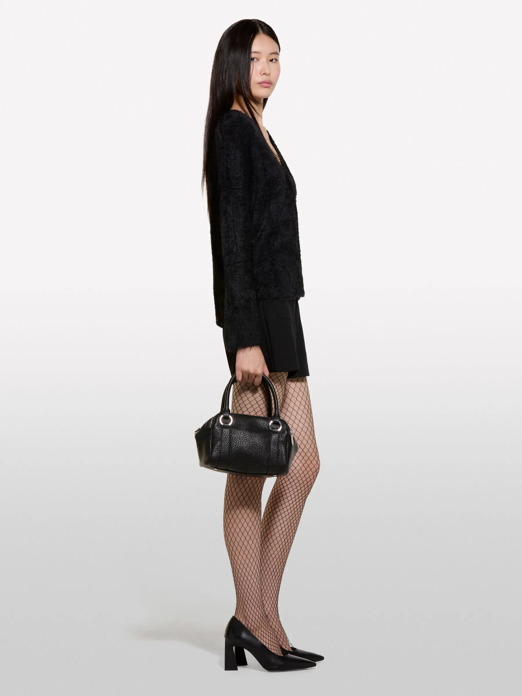 Nuovi arrivi      Cardigan nero effetto pelliccetta