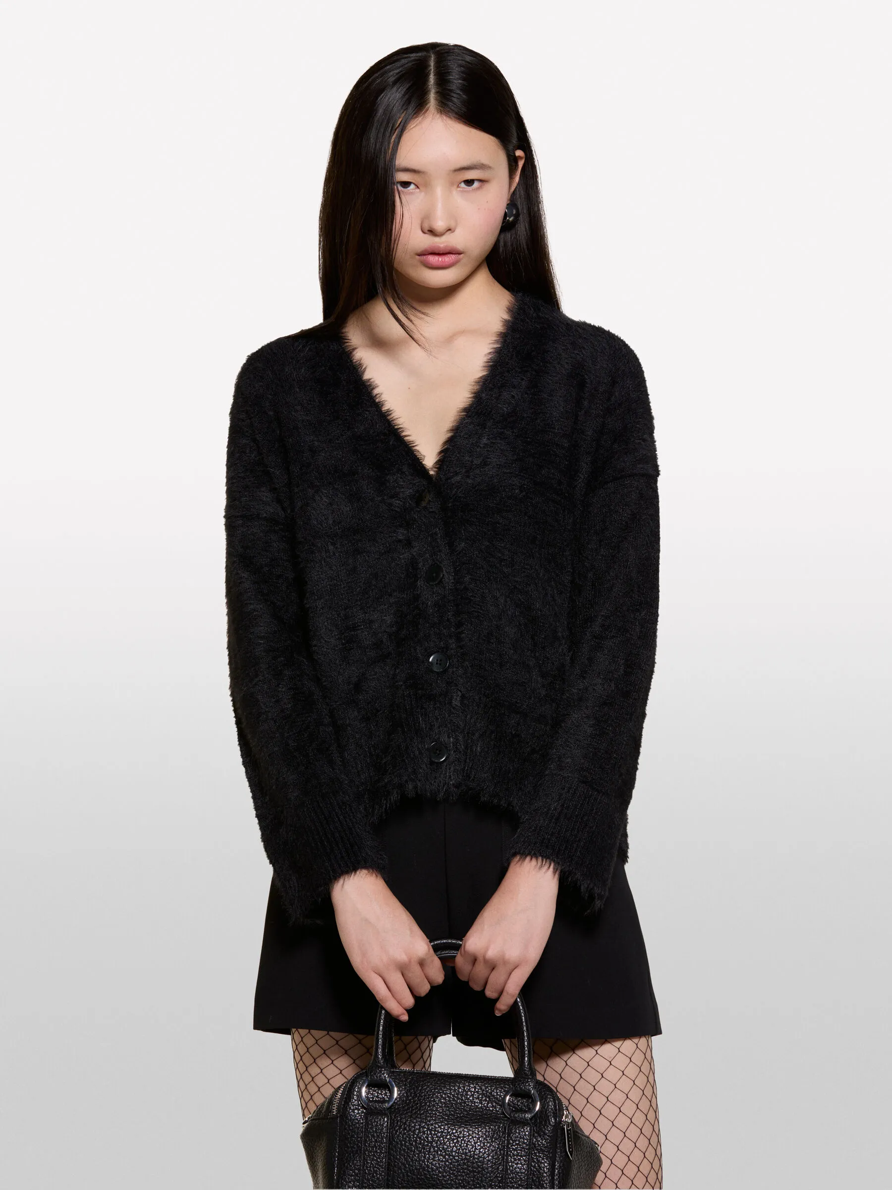 Nuovi arrivi      Cardigan nero effetto pelliccetta